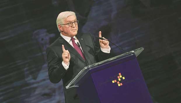 Steinmeier gives a talk during the celebrations for German Unity Day at the Rheingoldhalle in Mainz, central Germany.