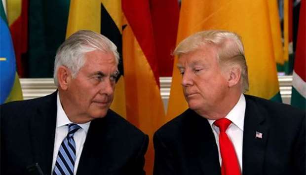 President Donald Trump and Secretary of State Rex Tillerson confer during the UN General Assembly in New York last month.