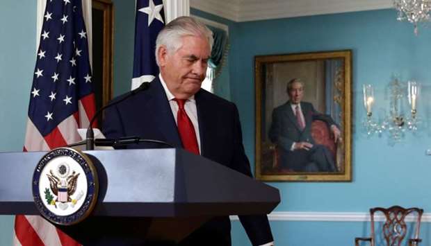 US Secretary of State Rex Tillerson leaves after making a statement to the media that he is not going to resign, at the State Department in Washington.