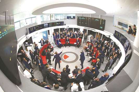 Traders react on the trading floor of the open outcry pit at the London Metal Exchange. Three-month nickel rose 1.1% to $10,735 a tonne on the LME yesterday, up 7.1% this year, but still a fraction of the highs above $50,000 seen in 2007.