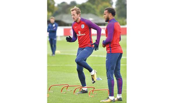 Englandu2019s Harry Kane (L) and Ryan Bertrand train during a national football team training session at the Tottenham Hotspur Training Ground in Enfield, north London.