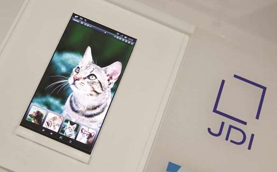 Japan Displayu2019s high resolution panel for mobile phone is displayed at its headquarters in Tokyo. Display makers are looking at mass producing organic light-emitting diode screens with a lower-cost printing process and if Japan Display was first, that could help it catch up with South Korean rivals after long being a laggard in OLED technology.