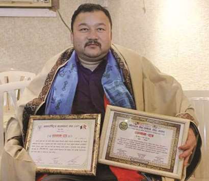 HONOURED: Tirtha Sangam Rai was recently honoured for his literary activities in the country.