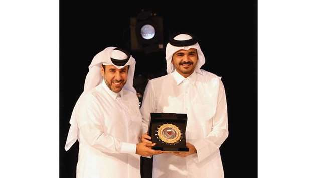 QOC president HE Sheikh Joaan bin Hamad al-Thani (right) with Dr Thani al-Kuwari, president of Qatar Athletics Federation, who were awarded as Golden Federation.