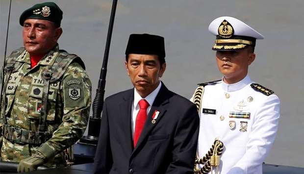 Indonesia's President Joko Widodo (C)