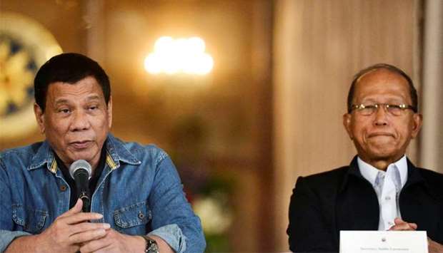 Philippine President Rodrigo Duterte and  Defence Secretary Delfin Lorenzana