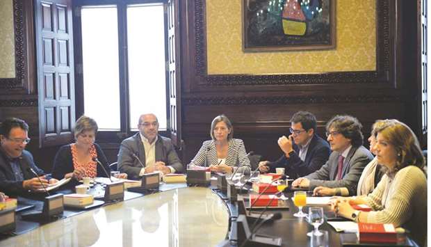 Catalan regional Parliament speaker Carme Forcadell (centre) presides over the partiesu2019 spokespersons board meeting at the Parliament in Barcelona yesterday.