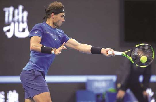Rafael Nadal of Spain in action against Karen Khachanov (not in picture) of Russia during their China Open match in Beijing yesterday. (Reuters)