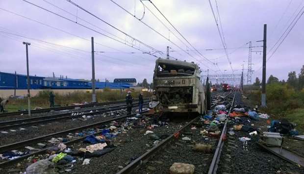 A handout picture released by Vladimir region branch of the Russian Interior Ministry shows the site of a collision, after a train slammed into a passenger bus that had broken down on a level crossing, near the city of Vladimir, some 110 kilometres east of the Russian capital.