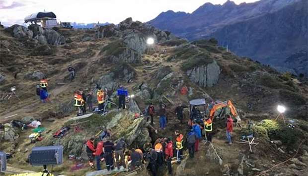 Rescuers working to pull a two-year-old girl unharmed out of a crevice she tumbled into during a family hike near Aletsch glacier in the Swiss Alps, on Friday.