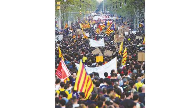Protesters gather at the Placa de la Universitat square during a general strike in Catalonia called by Catalan unions in Barcelona.