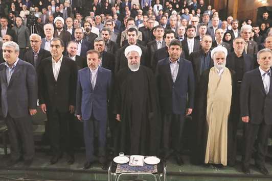A handout picture provided by the Iranian Presidency yesterday shows President Hassan Rouhani attending a ceremony at Tehran University marking the beginning of a new academic year.