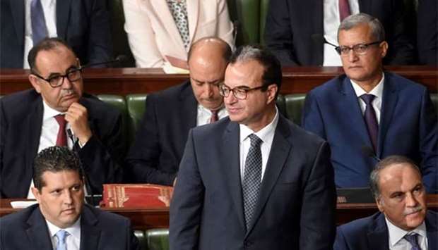 Tunisian health minister Slim Chaker (centre) is seen in this file photo.
