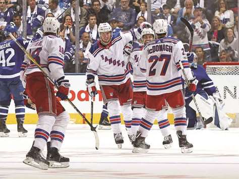 New York Rangers celebrate a goal against the Toronto Maple Leafs in their NHL game at the Air Canada Centre in Toronto. (Getty Images/AFP)