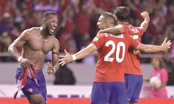 Costa Ricau2019s Kendall Waston (left) ecstatic after netting an equaliser against Honduras during their World Cup qualifier in San Jose on Saturday night. (AFP)