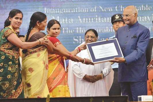 President Ram Nath Kovind attends a programme organised to unveil Amrita clean water initiatives by the Mata Amritanandamayi Math in Kollam yesterday.
