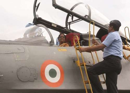 Defence Minister Nirmala Sitharaman sits inside the cockpit of a Sukhoi 30 MKI fighter jet during her visit to the Air Force Station in Tezpur, Assam yesterday.