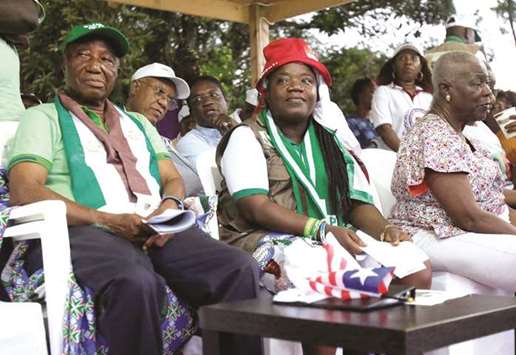 Joseph Nyuma Boakai (left), Liberiau2019s vice president and presidential candidate of Unity Party (UP), is seen during their partyu2019s presidential campaign rally in Monrovia.