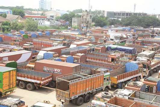 Trucks are parked at a yard during a two-day nationwide strike, in Chennai yesterday.