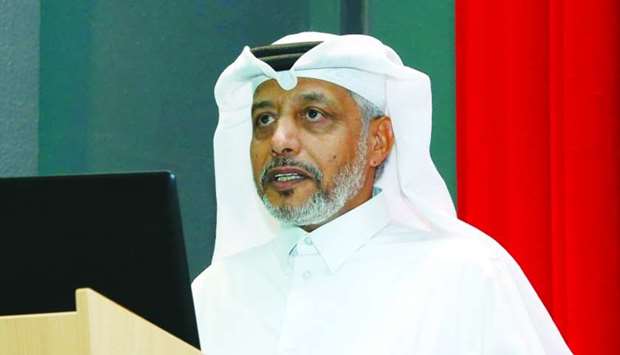 Mohamed al-Muhannadi speaking at the meeting