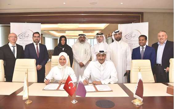 QBA and MUSIAD officials after signing the agreement.