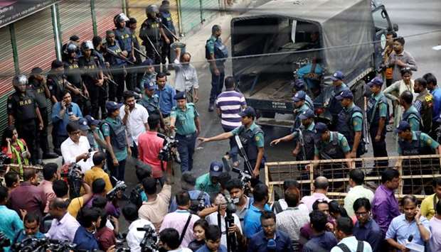Police block a road near the court during the trial of the August 21, 2004 grenade attack case in Dhaka, Bangladesh. Reuters