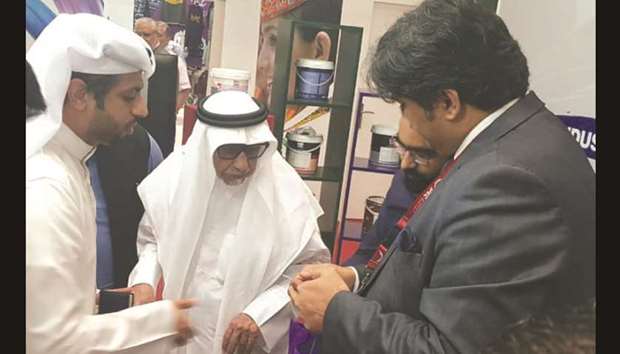 HE Sheikh Khalid bin Hamad al-Thani at the Happilac Paints stall.