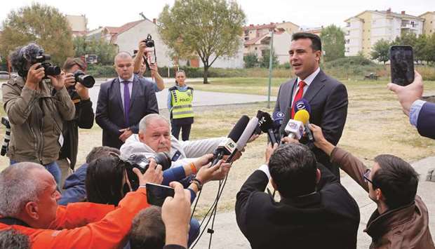 Macedoniau2019s Prime Minister Zoran Zaev talks to the press after casting his ballot in Strumica yesterday.