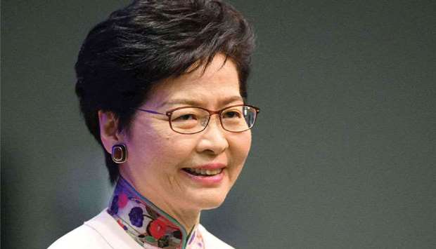 Hong Kongu2019s Chief Executive Carrie Lam arrives at a press conference after delivering her annual policy address at the Legislative Council (Legco) in Hong Kong yesterday.
