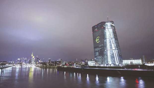 An illuminated euro currency symbol is projected on to the ECB headquarters during a light festival in Frankfurt (file). Following the September 13 meeting, ECB president Mario Draghi told journalists that risks to the 19-nation single currency area remained u201cbroadly balancedu201d.