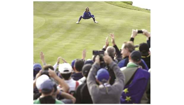 Europeu2019s English player Tommy Fleetwood celebrates after Europe won the 42nd Ryder Cup at Le Golf National Course at Saint-Quentin-en-Yvelines, south-west of Paris, on Sunday. (AFP)