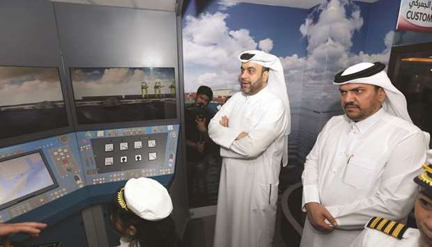 Mwani Qatar chief executive al-Khanji (centre) at the opening of its facility at KidzMondo Doha yesterday.
