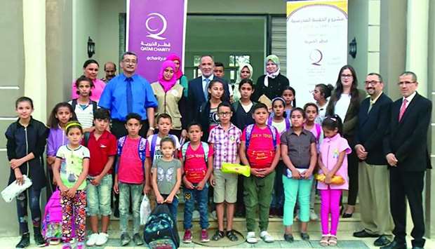 Some of the children who received school supplies from Qatar Charity in Tunisia.