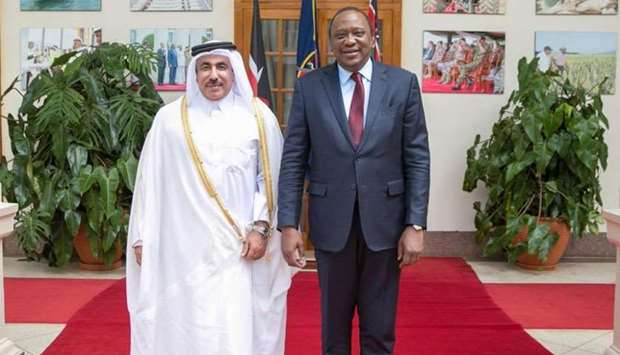 HE the Minister of Transport and Communications Jassim bin Said al-Sulaiti with Kenyan President Uhuru Kenyatta