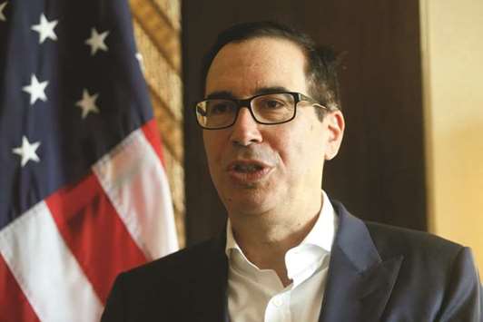 US Secretary of the Treasury Steven Mnuchin speaks during an interview with Reuters at the International Monetary Fundu2013World Bank Annual Meeting 2018 in Nusa Dua, Indonesia. Mnuchin said China needs to identify concrete u201caction itemsu201d to rebalance the two countriesu2019 trade relationship before talks to resolve their disputes can resume.