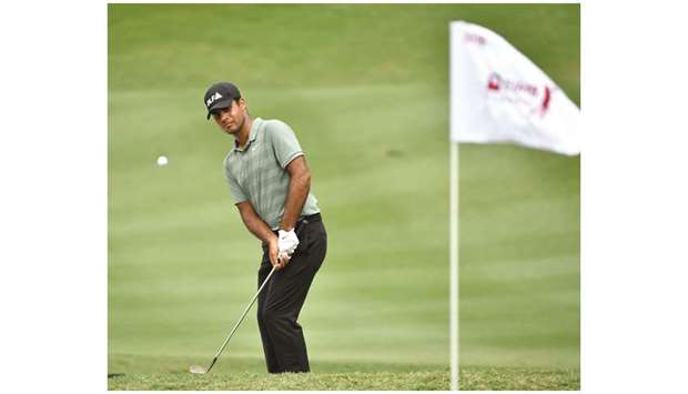 Shubhankar Sharma chipping onto the green during the third round of the CIMB Classic golf tournament at the TPC Kuala Lumpur.  (AFP)