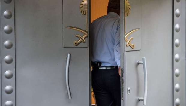 A security member of the consulate stands at the doors of the Saudi Arabian consulate in Istanbul yesterday.