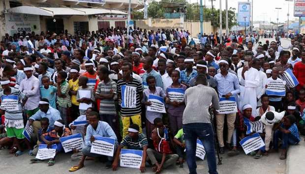 Somali people gather to commemorate the first anniversary of bombing attack which killed more than 500 people, the worst in the history of violence in Somalia