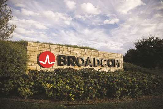 A signage is displayed outside of Broadcom headquarters in Irvine, California. The Justice Department and Securities and Exchange Commission are both asking whether a memo by Broadcom may have been part of an effort to manipulate the companiesu2019 share prices, sources said.