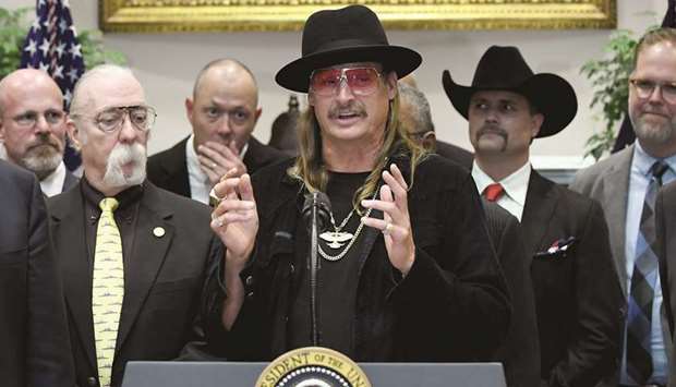 MUSICIAN: Kid Rock speaks before President Donald Trump signs the Music Modernization Act into law.
