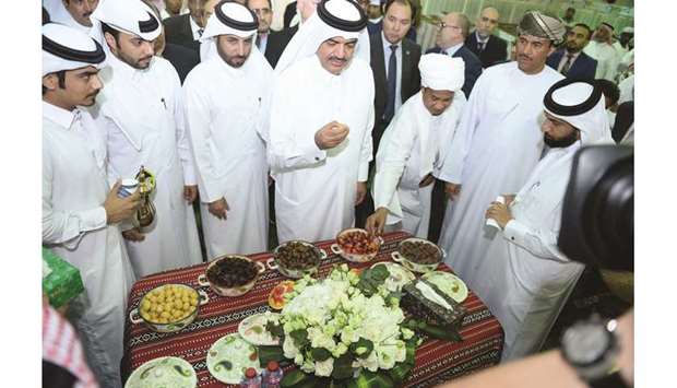 HE the Minister of Municipality and Environment Mohamed bin Abdullah al-Rumaihi and other dignitaries at the first local dates festival, in Doha yesterday. PICTURE: Shaji Kayamkulam
