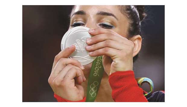 Aly Raisman of USA with her floor exercise silver medal at the 2016 Rio Olympics. (Reuters)