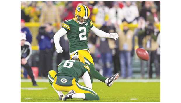 Green Bay Packers kicker Mason Crosby (tight) kicks the game-winning field goal during the NFL game against the San Francisco 49ers in Green Bay, Wisconsin, on Monday. (USA TODAY Sports)