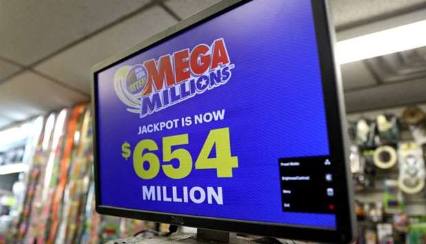 Sign displays the jackpot for Tuesday's Mega Millions drawing after it rose over $650 million in New York City