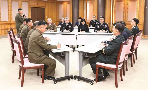 United Nations Command, South Korean and North Korean military officers attend a meeting at the Truce Village of Panmunjom in the Demilitarized Zone, South Korea.