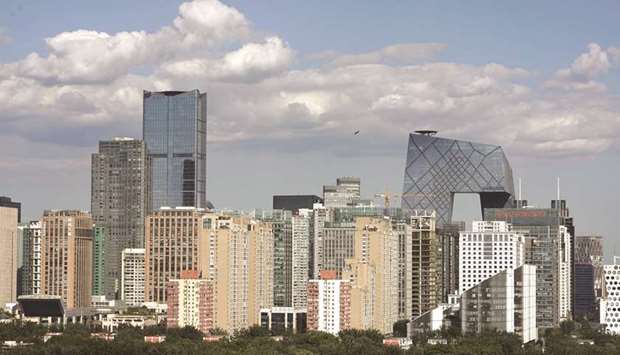 The skyline of Beijingu2019s central business district on a sunny day. Chinese local governmentsu2019 off-balance-sheet borrowings might be as high as 30tn to 40tn yuan, S&P Global Ratings said in a report yesterday.