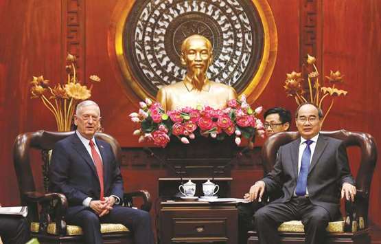 US Secretary of Defence Jim Mattis, left, meets Vietnam communist party chief Nguyen Thien Nhan in Ho Chi Minh City yesterday.