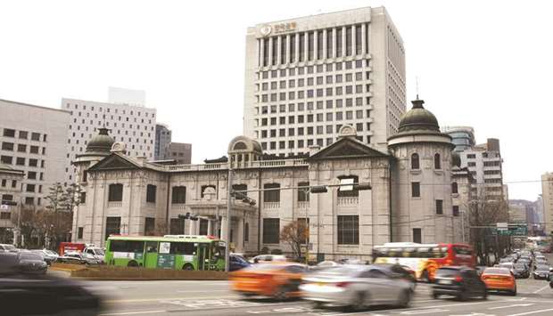 The Bank of Korea headquarters building in Seoul. With the interest-rate market almost fully-priced for a 25 basis point hike by year-end, all eyes are on the October 18 meeting to see if the central bank will act now or wait till next month.