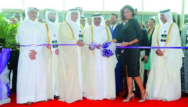HE the Minister of Transport and Communications Jassim bin Saif al-Sulaiti (centre) inaugurates the 8th edition of Qatar Motor Show at DECC. PICTURE: Jayan Orma.