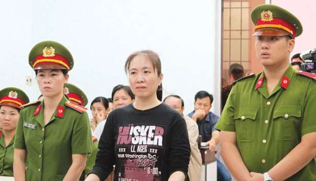 In this file photo, prominent Vietnamese blogger Nguyen Ngoc Nhu Quynh, centre, attending her appeal trial at a local peopleu2019s court in the central coastal city of Nha Trang.